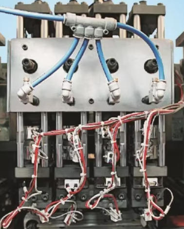 ماكينة تعبئة وتغليف نظام رأس القالب ملحقات ماكينات نفخ القوالب